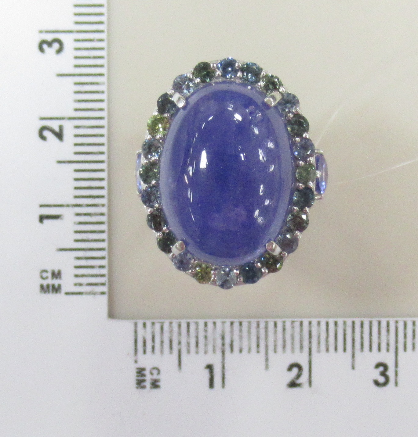 Серебряное кольцо 925 пробы; вставки 3 Танзанит; 24 Мультисапфир;